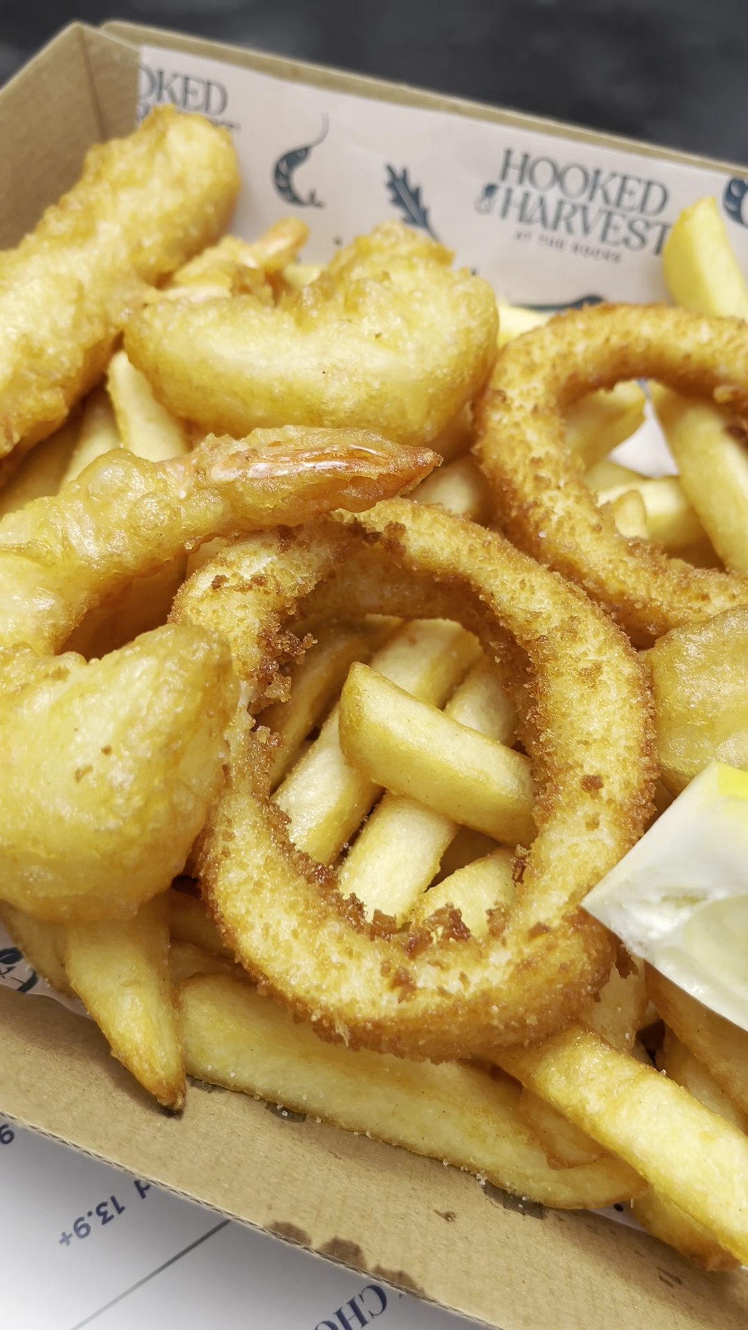 Fresh seafood and fried sides at Hooked and Harvest